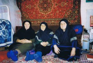 Mollah Nazkhanum (in the middle) with her students